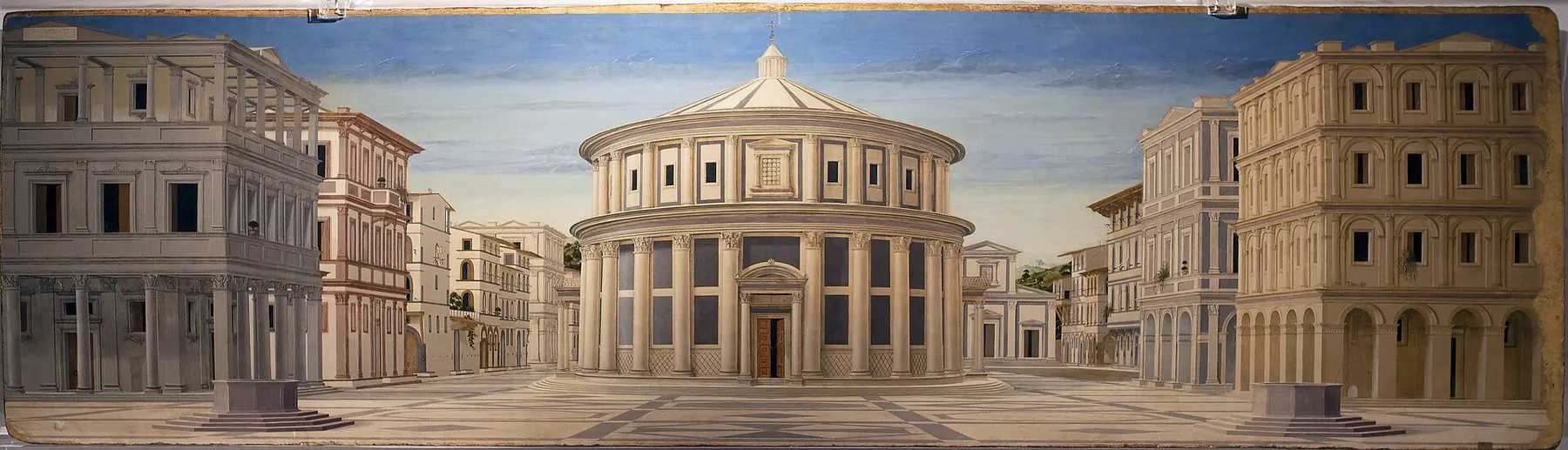 An ordered Renaissance city arranged around a central civic building.