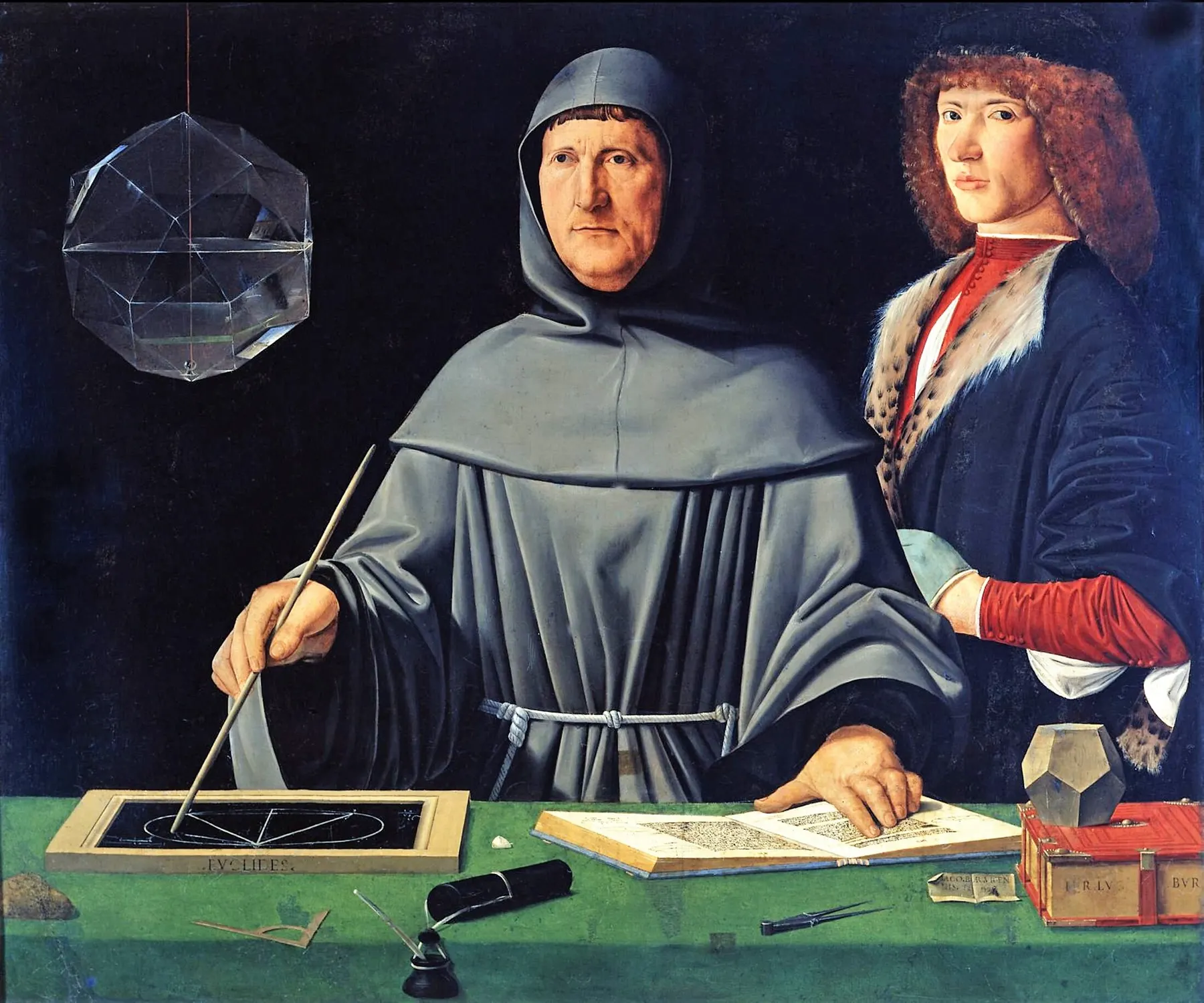 Luca Pacioli studying mathematics beside a young man.